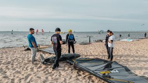 Maciek helps to fine-tune the gear
