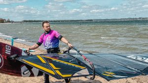 windsurfer exiting the water