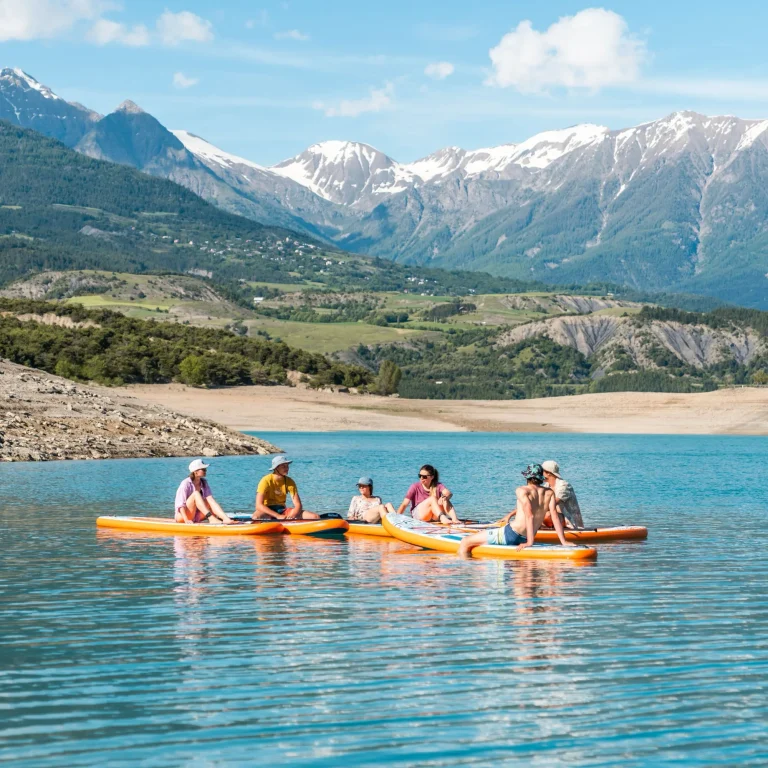 People chilling on Aqua Marina Pure Air Coast boards