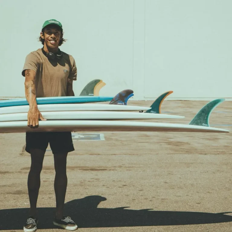 Futures fins - man holding surfboards