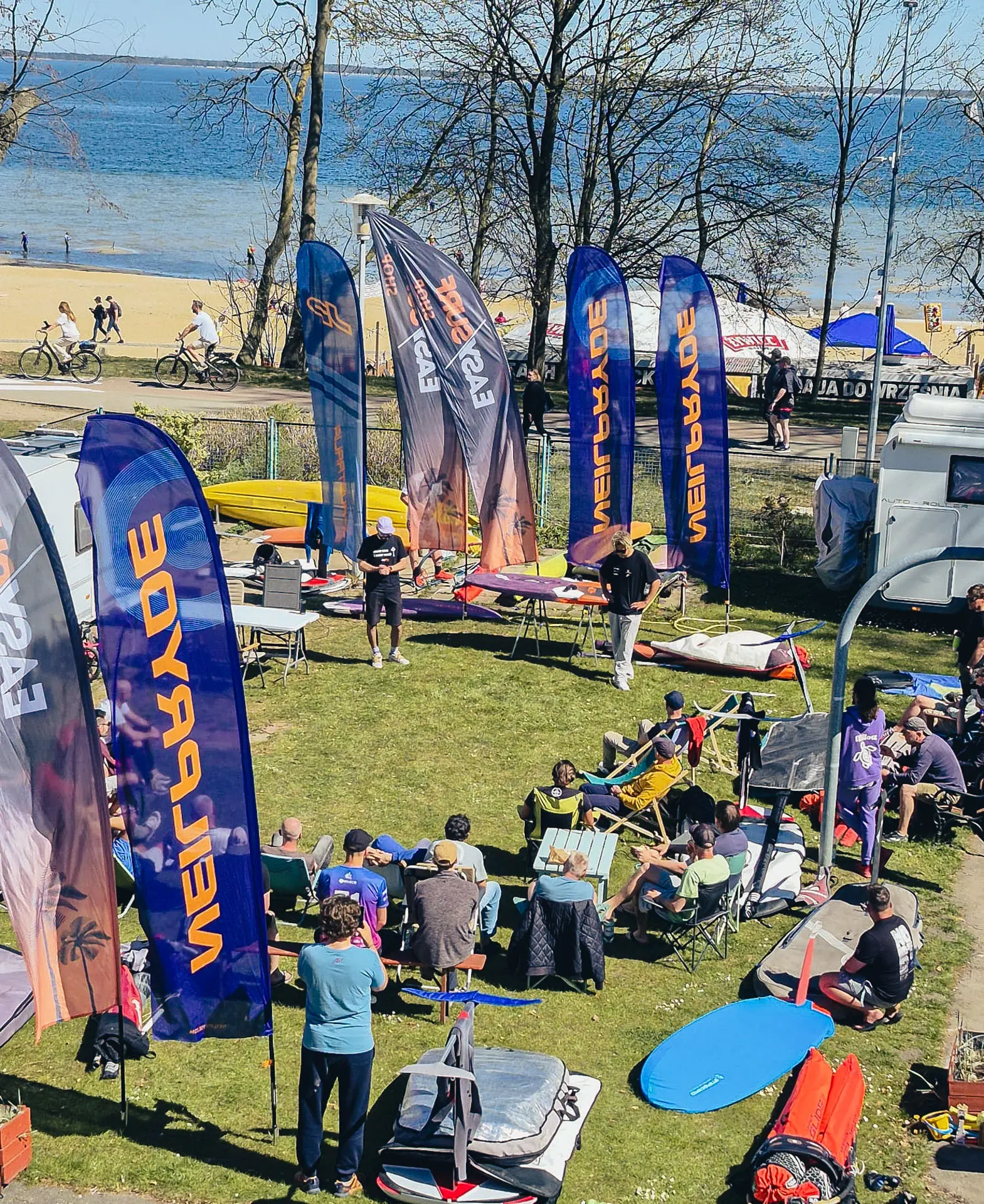 Windsurf clinics Puck May 2026 – view of the venue with flags and participants