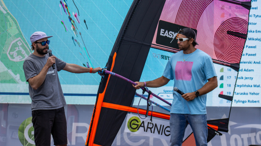 Jaro and Matteo Iachino on the stage presenting the new NeilPryde Speedster EVO sail at Garnier King of the Bay watersports festival in Rewa
